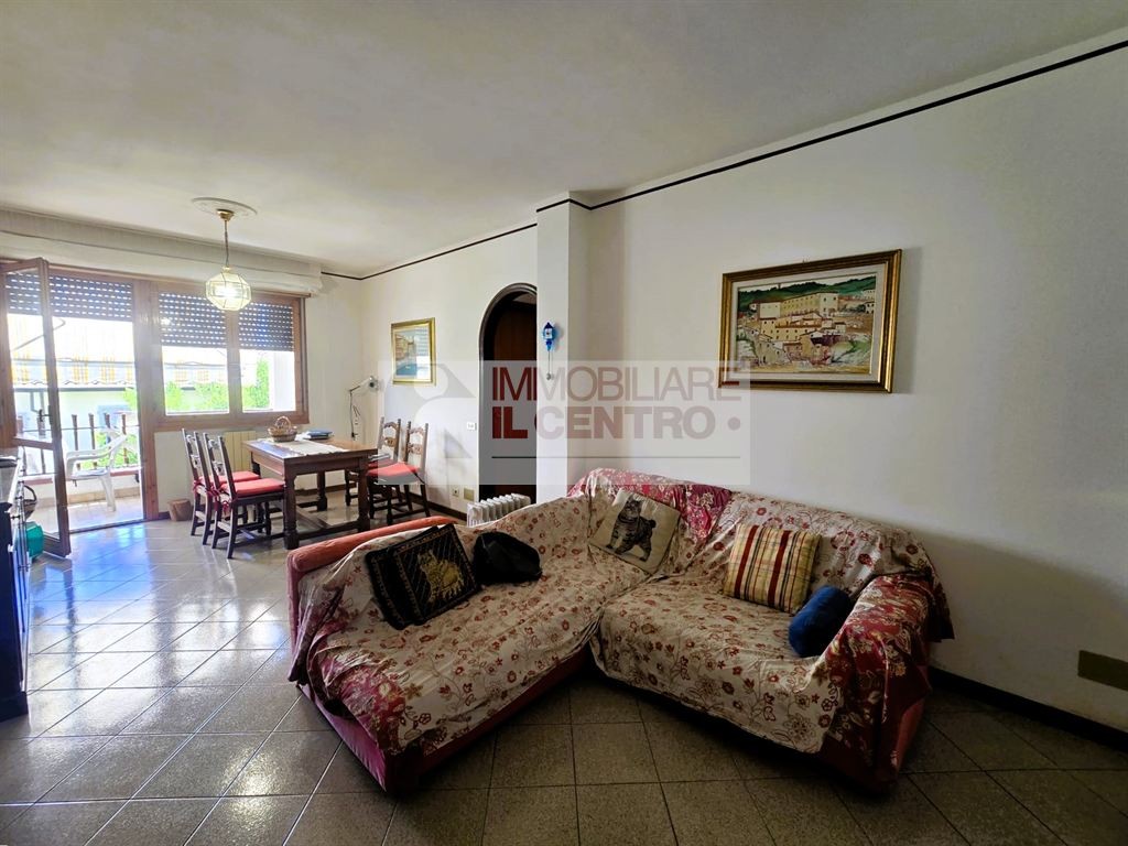 APPARTAMENTO CON GIARDINO E POSTO AUTO