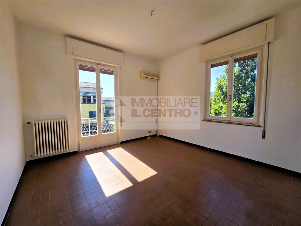 trilocale con doppi servizi e posto auto
