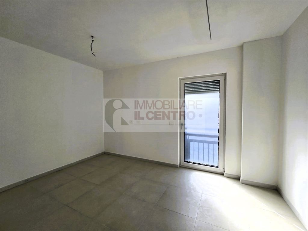 BILOCALE CON TERRAZZA E UN POSTO AUTO